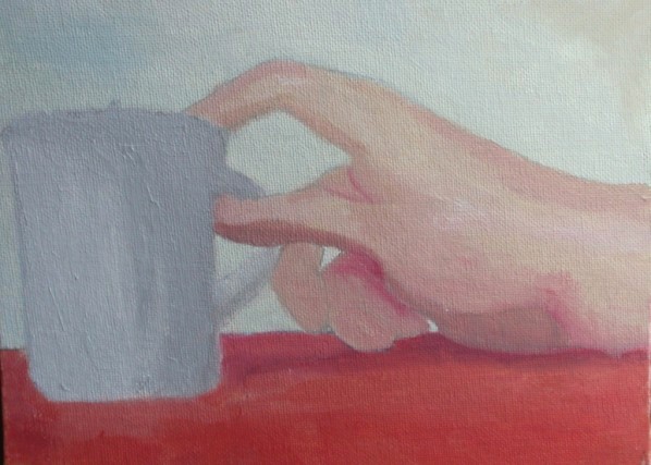 hand and cup