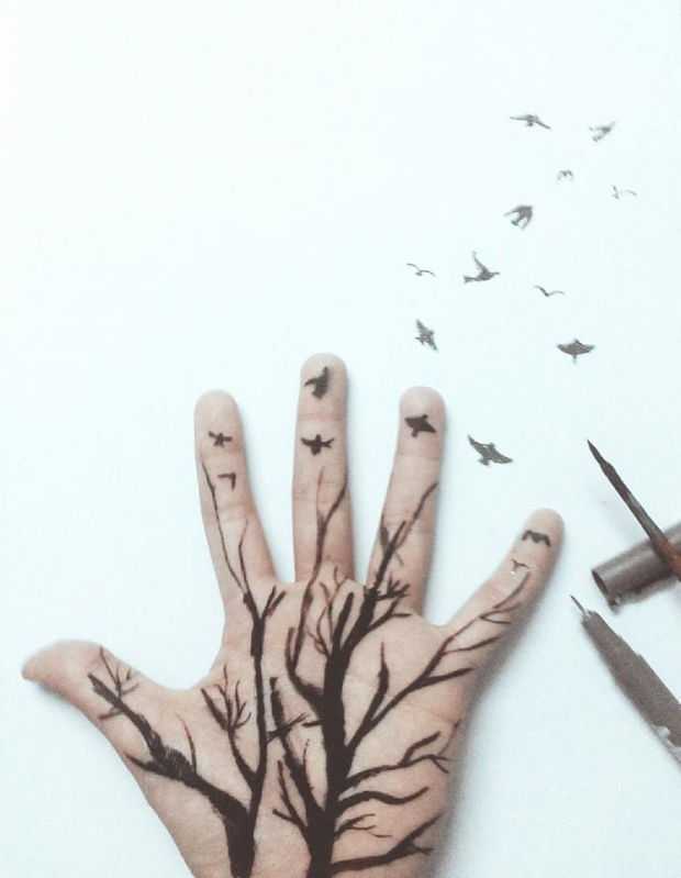 Hand, birds and tree