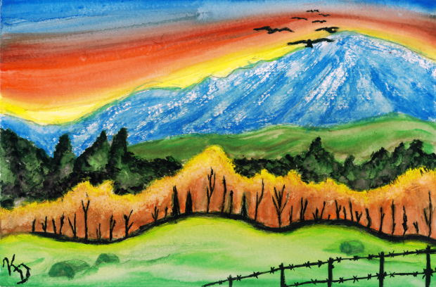 Rainbow Colored Sunset Against the Fall Mountain