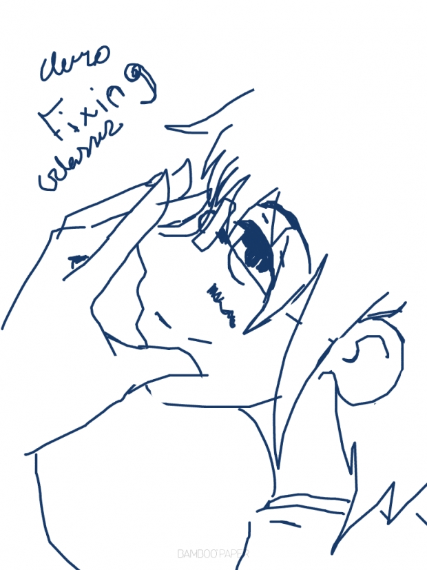 Auro fixing his glasses