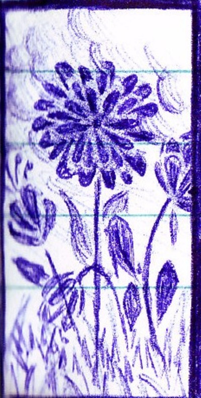 Flowers in grass field