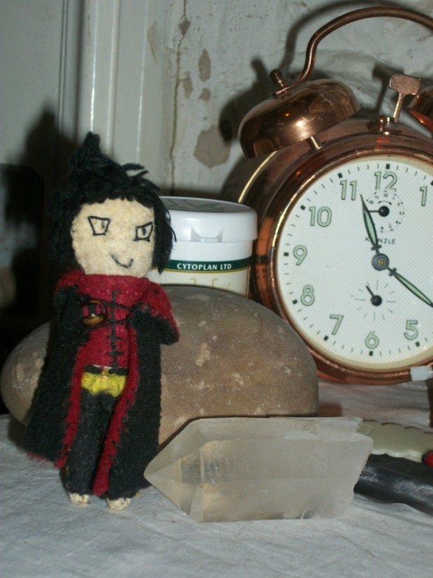 Tao Ren/Len doll next to my alarm clock